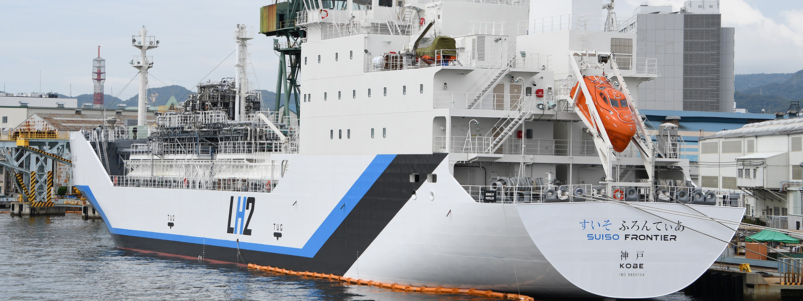 A rear view of a large tanker ship in port in Kobe, Japan, in 2020.