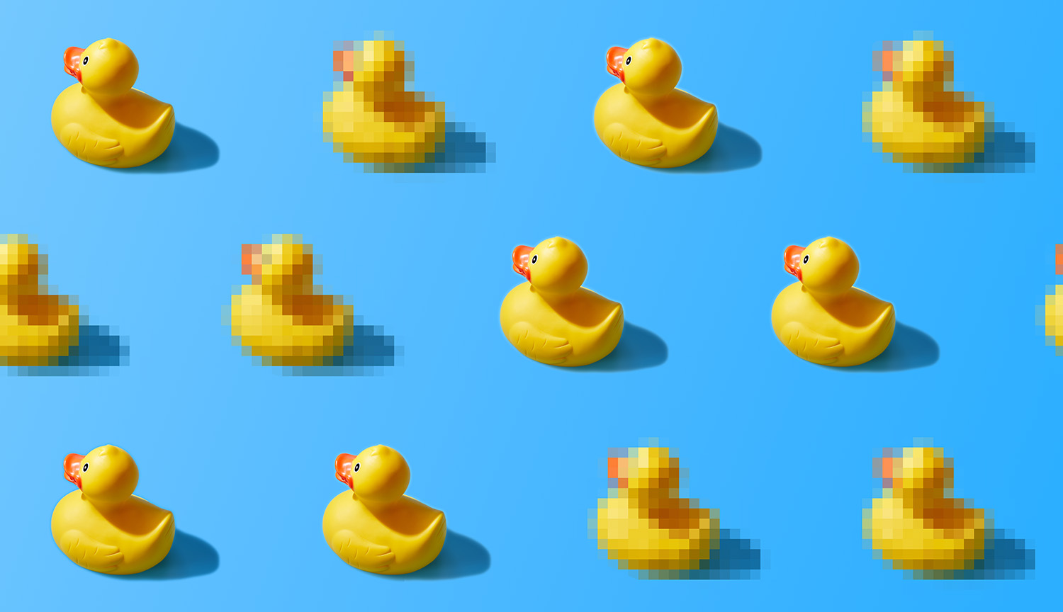 Filas de patitos de goma amarillos, algunos borrosos y pixelados.